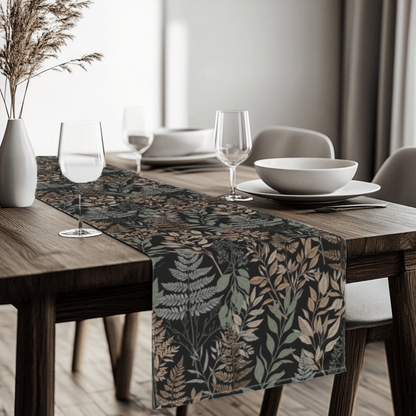 Nature inspired botanical table runner styled across a modern dining table with neutral table setting.