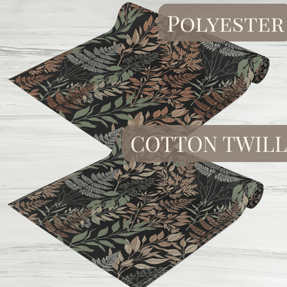Botanical fern table runner displayed in polyester and cotton twill fabric options.